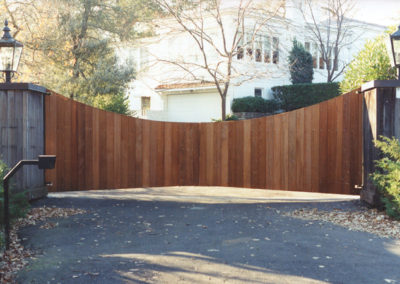 Concave Top Bi-Parting Driveway Gate w/ Solid Redwood Panels