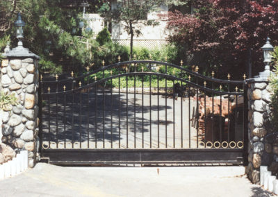 Bell Curve Driveway Gate w/ Gold Spear Tip Finials on Both Top & Top Border w/ Gold Circle Topped Recessed Bottom Panel