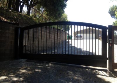 Arch Top Driveway Gate w/ Recessed Panel Frame - Downhill Swing