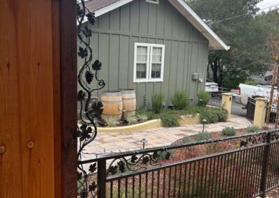 Detail - Grapevine Motif Side Panel Between Metal & Wood Fence
