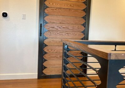 Interior Sliding Barn Door & Coordinating Landing Railing of Wood & Metal